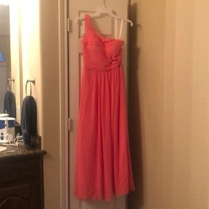 Coral one sleeve bridesmaid dress